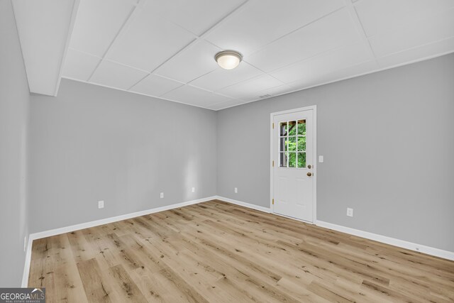 1407 Water Wheel Dr, Bethlehem, GA 30620 - spare room with wood finished floors, baseboards, and a drop ceiling