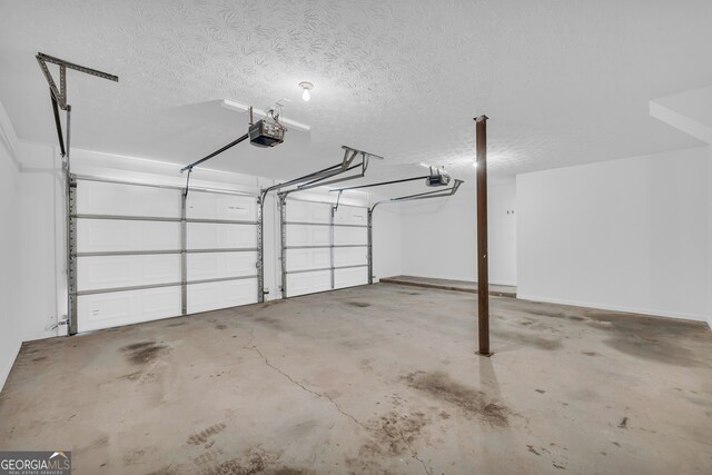 1407 Water Wheel Dr, Bethlehem, GA 30620 - garage featuring a garage door opener