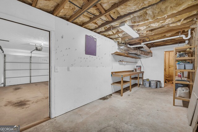1407 Water Wheel Dr, Bethlehem, GA 30620 - unfinished basement featuring a workshop area