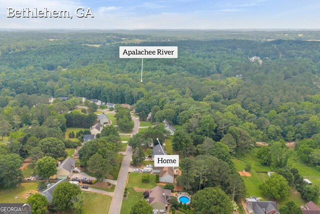 1407 Water Wheel Dr, Bethlehem, GA 30620 - aerial overview of property's location featuring a forest