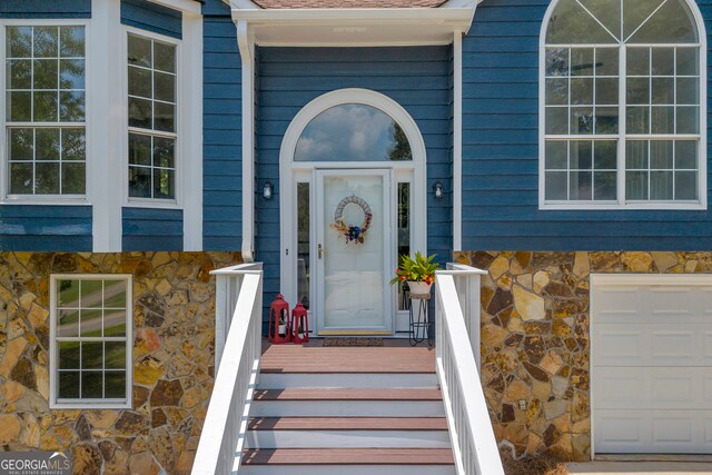1407 Water Wheel Dr, Bethlehem, GA 30620 - doorway to property featuring stone siding