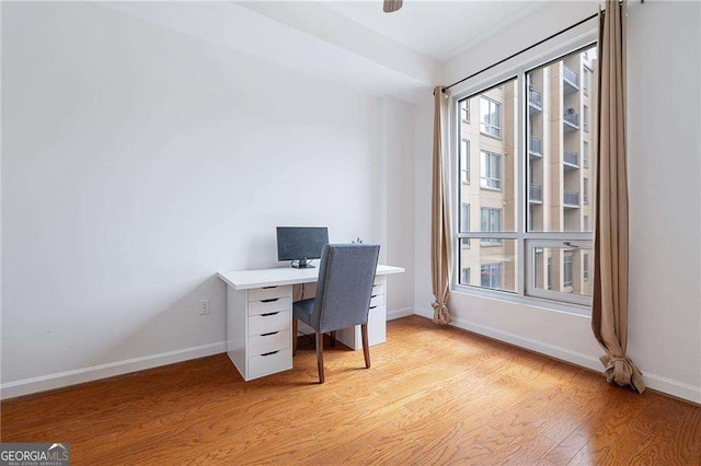 711 Cosmopolitan Dr NE Unit 300, Atlanta, GA 30324 - office with baseboards and light wood-style flooring