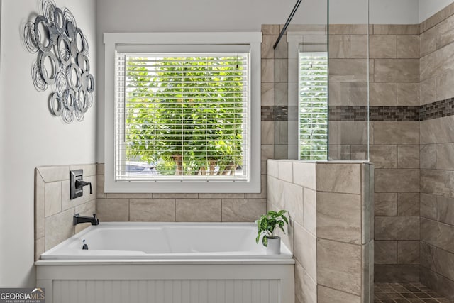 1111 Cobblestone Dr, Bogart, GA 30622 - bathroom with tiled shower and a garden tub