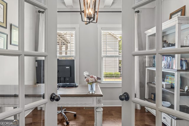 1111 Cobblestone Dr, Bogart, GA 30622 - office featuring a chandelier, wood finished floors, beam ceiling, and baseboards
