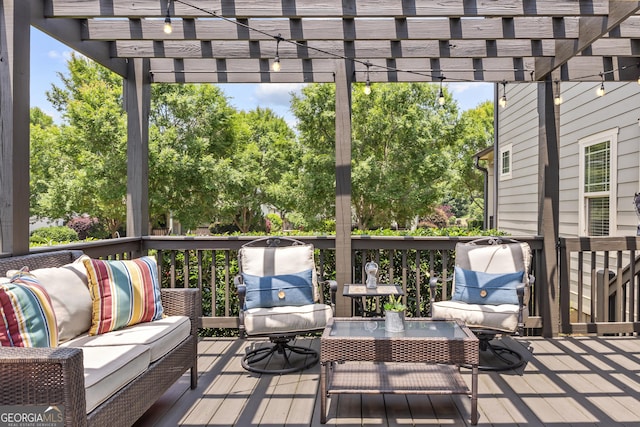 1111 Cobblestone Dr, Bogart, GA 30622 - deck with an outdoor hangout area, a pergola, and view of wooded area