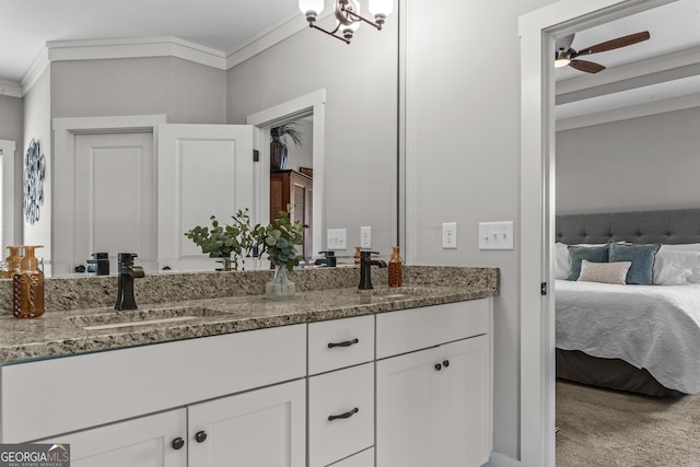 1111 Cobblestone Dr, Bogart, GA 30622 - bathroom featuring double vanity, crown molding, connected bathroom, and a ceiling fan