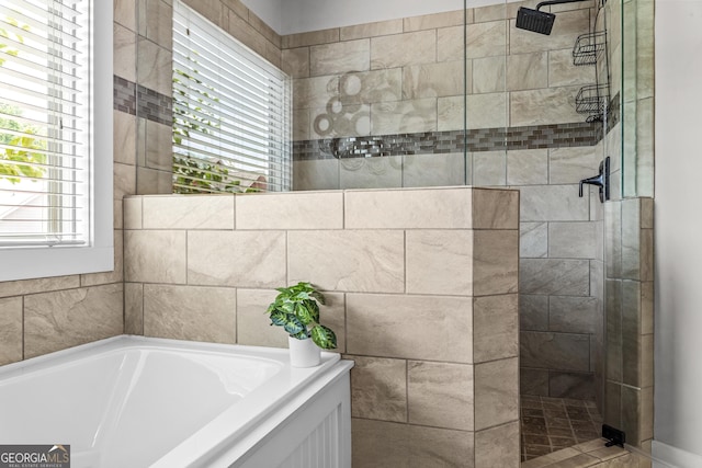 1111 Cobblestone Dr, Bogart, GA 30622 - bathroom with a bath and walk in shower