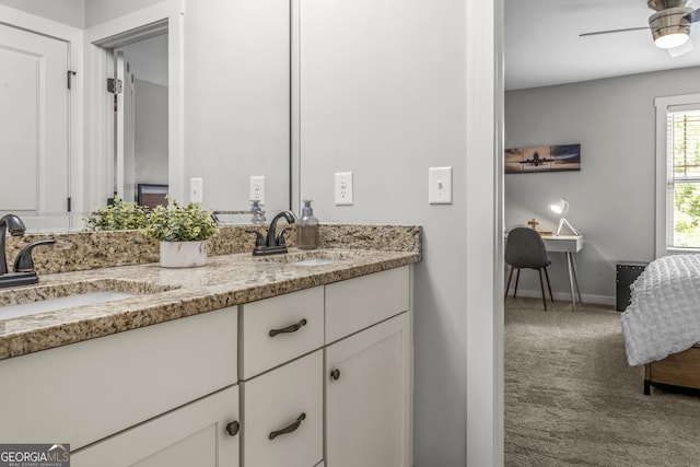 1111 Cobblestone Dr, Bogart, GA 30622 - bathroom featuring double vanity, baseboards, and ceiling fan