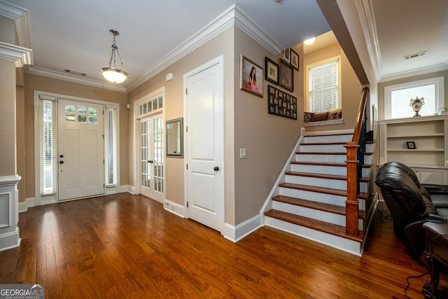 13042 Dartmore Ave, Alpharetta, GA 30005 - foyer with ornamental molding, dark wood-type flooring, stairway, and baseboards