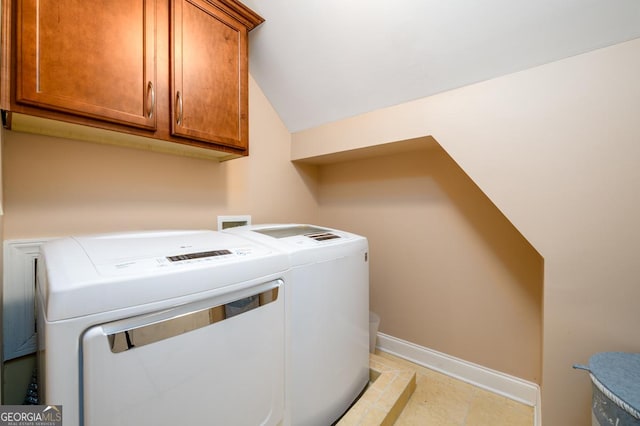 13042 Dartmore Ave, Alpharetta, GA 30005 - laundry room with washing machine and clothes dryer, baseboards, and cabinet space