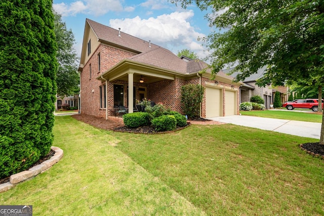 13042 Dartmore Ave, Alpharetta, GA 30005 - view of front of home featuring brick siding, an attached garage, concrete driveway, and a front lawn