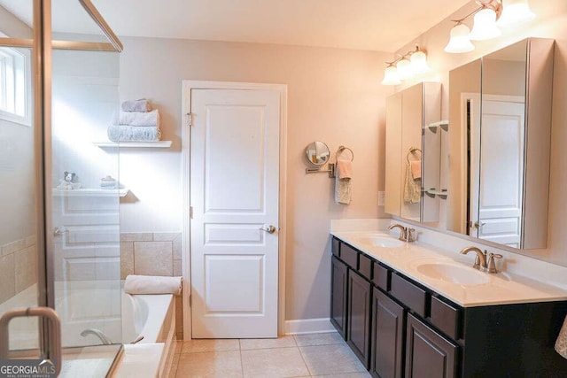6298 Pierless Ave, Sugar Hill, GA 30518 - bathroom with double vanity, a bath, and tile patterned floors