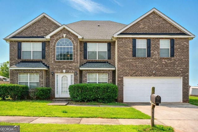 3731 Laramie Rd, Ellenwood, GA 30294 - traditional-style home featuring driveway, an attached garage, brick siding, a front lawn, and a shingled roof