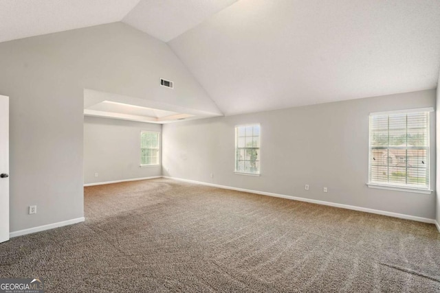 3731 Laramie Rd, Ellenwood, GA 30294 - carpeted spare room with vaulted ceiling and baseboards