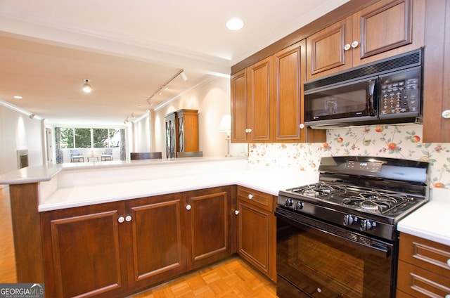 2734 Peachtree Rd NW Unit C-404, Atlanta, GA 30305 - kitchen featuring black appliances, a peninsula, ornamental molding, light countertops, and brown cabinetry