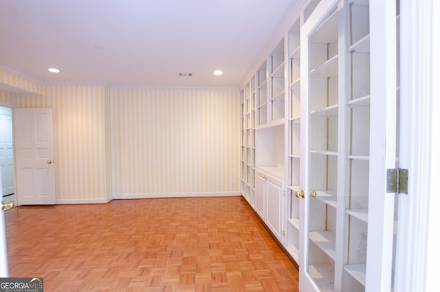 2734 Peachtree Rd NW Unit C-404, Atlanta, GA 30305 - spare room with wallpapered walls, ornamental molding, baseboards, and recessed lighting