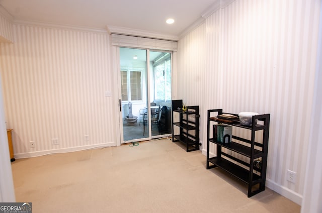 2734 Peachtree Rd NW Unit C-404, Atlanta, GA 30305 - living area featuring ornamental molding, light colored carpet, and baseboards