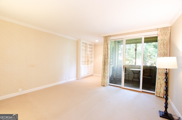 2734 Peachtree Rd NW Unit C-404, Atlanta, GA 30305 - spare room with crown molding, baseboards, and carpet