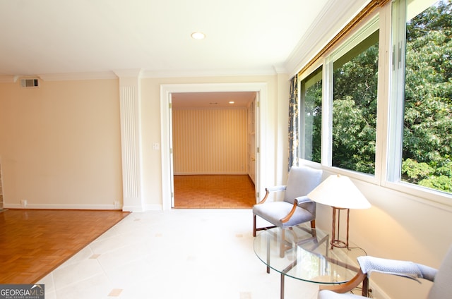 2734 Peachtree Rd NW Unit C-404, Atlanta, GA 30305 - living area with healthy amount of natural light, crown molding, baseboards, and recessed lighting