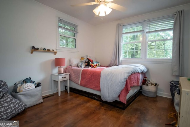 2060 Simonton Bridge Rd, Watkinsville, GA 30677 - bedroom with multiple windows, wood finished floors, baseboards, and ceiling fan