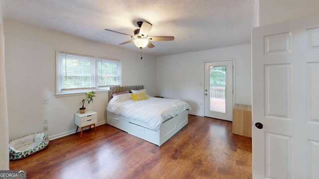 2060 Simonton Bridge Rd, Watkinsville, GA 30677 - bedroom with multiple windows, wood finished floors, access to exterior, and baseboards
