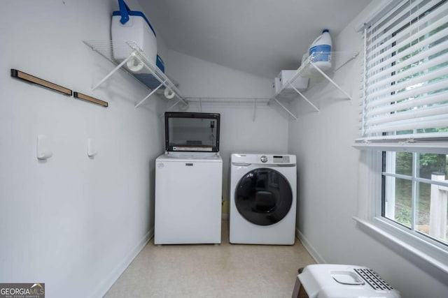 2060 Simonton Bridge Rd, Watkinsville, GA 30677 - laundry area with washer and dryer, baseboards, and light floors