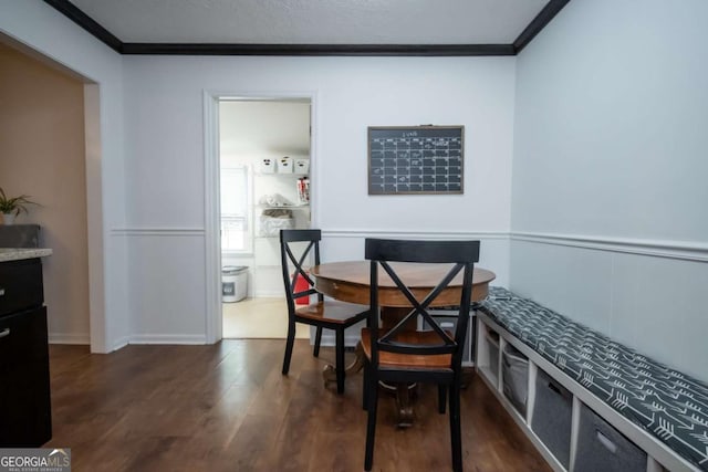 2060 Simonton Bridge Rd, Watkinsville, GA 30677 - dining room with crown molding and dark wood-type flooring