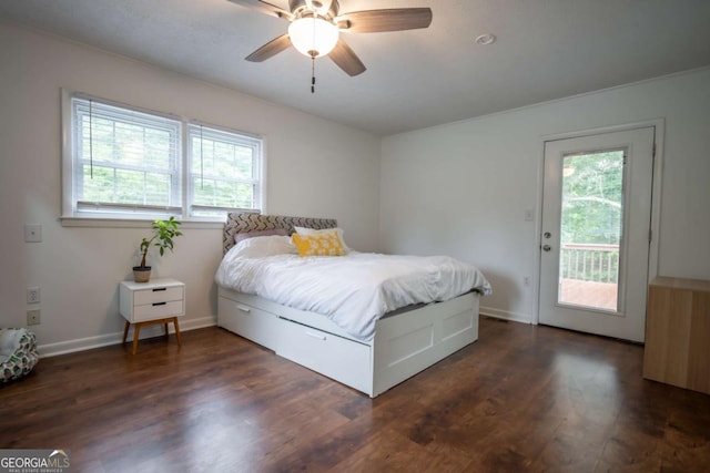 2060 Simonton Bridge Rd, Watkinsville, GA 30677 - bedroom featuring multiple windows, access to exterior, dark wood-style flooring, and baseboards