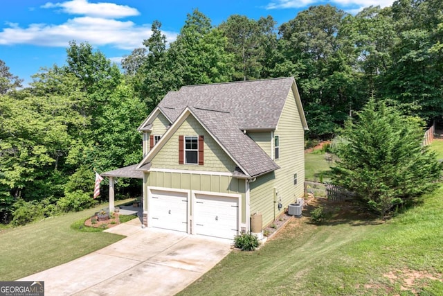 6540 Terracewood Ln, Gainesville, GA 30506 - view of front facade with central air condition unit, board and batten siding, concrete driveway, roof with shingles, and a front lawn