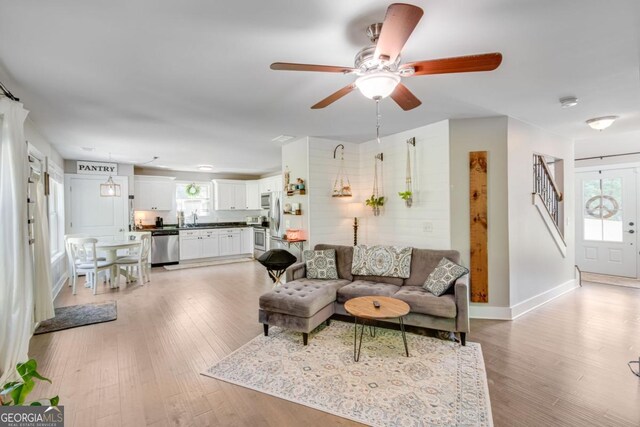 6540 Terracewood Ln, Gainesville, GA 30506 - living area with plenty of natural light, light wood-type flooring, and ceiling fan