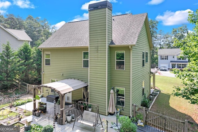 6540 Terracewood Ln, Gainesville, GA 30506 - back of property with a patio area, a chimney, roof with shingles, and a gate