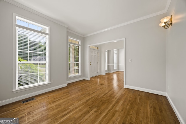 85 Bloomfield Way, Sharpsburg, GA 30277 - empty room with baseboards, ornamental molding, and wood finished floors