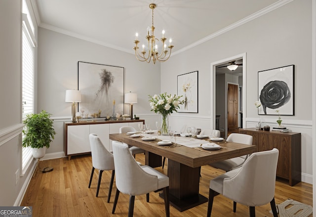 85 Bloomfield Way, Sharpsburg, GA 30277 - dining room featuring crown molding, a chandelier, light wood-style flooring, and wainscoting