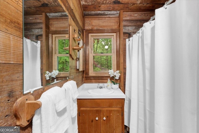 15 Bailey St, Whitesburg, GA 30185 - bathroom with wood walls, vanity, and wood ceiling