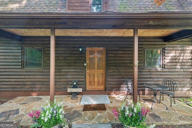 15 Bailey St, Whitesburg, GA 30185 - property entrance with a shingled roof and a porch