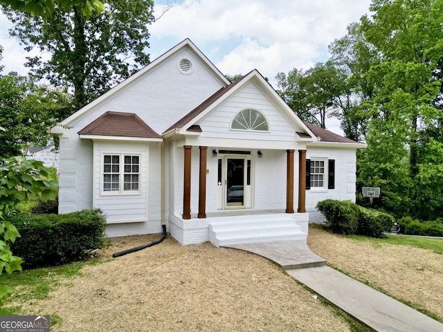 11 Stonegable Dr NW, Rome, GA 30165 - view of front facade with brick siding and covered porch