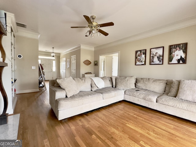 11 Stonegable Dr NW, Rome, GA 30165 - living room featuring crown molding, ceiling fan, and wood finished floors