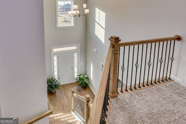 895 Lillian Park Dr, Grovetown, GA 30813 - entrance foyer with a chandelier, a high ceiling, wood finished floors, and baseboards