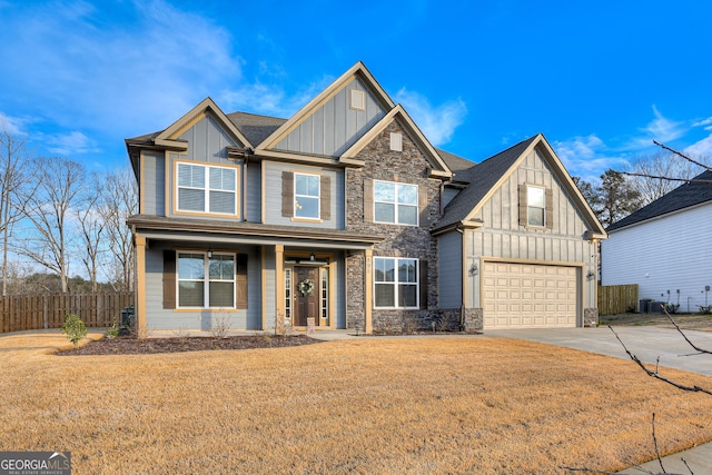 895 Lillian Park Dr, Grovetown, GA 30813 - craftsman inspired home featuring board and batten siding, stone siding, concrete driveway, an attached garage, and covered porch