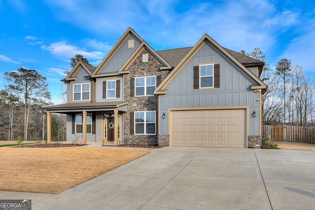 895 Lillian Park Dr, Grovetown, GA 30813 - craftsman-style house with stone siding, board and batten siding, driveway, and an attached garage