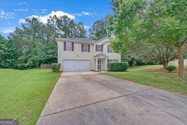 7459 Old Chapel, South Fulton, GA 30349 - traditional-style home with concrete driveway, an attached garage, and a front lawn