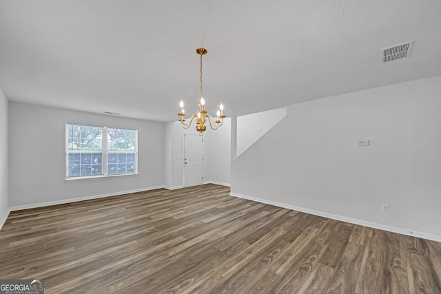 7459 Old Chapel, South Fulton, GA 30349 - unfurnished room featuring a chandelier and wood finished floors