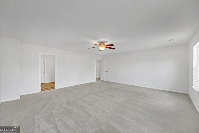 7459 Old Chapel, South Fulton, GA 30349 - spare room with ceiling fan and carpet flooring