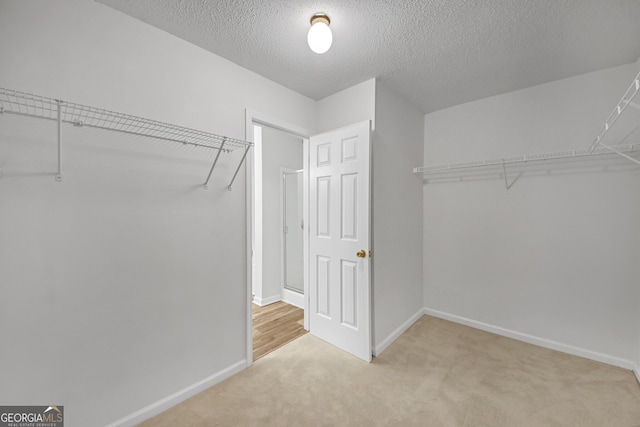7459 Old Chapel, South Fulton, GA 30349 - spacious closet with carpet flooring