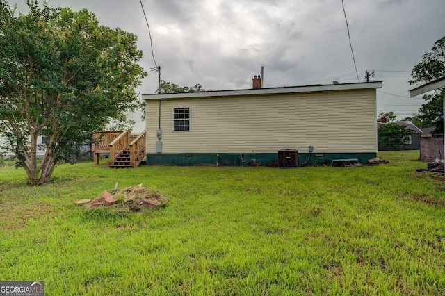 6 Mill St, Jackson, GA 30233 - rear view of property featuring crawl space, a wooden deck, a yard, and stairway