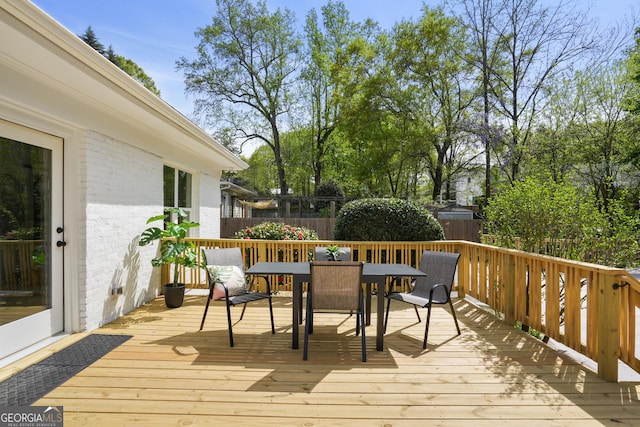 102 Rockyford Rd, Atlanta, GA 30317 - wooden deck featuring outdoor dining area
