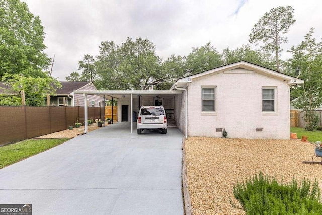913 7th Ave, Albany, GA 31701 - view of front of home with crawl space, driveway, and a carport