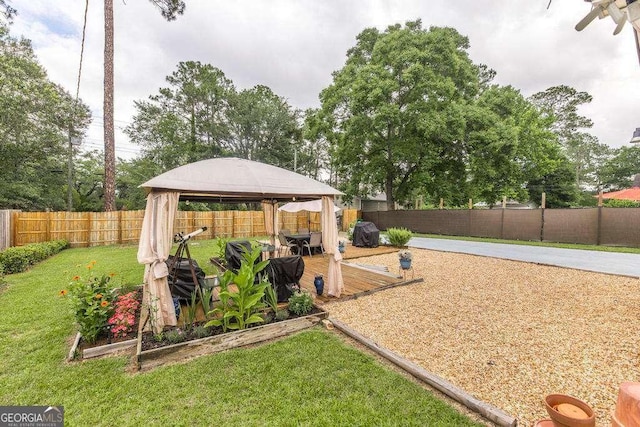 913 7th Ave, Albany, GA 31701 - fenced backyard featuring a gazebo