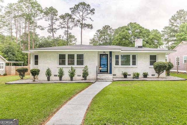 913 7th Ave, Albany, GA 31701 - ranch-style house featuring crawl space, brick siding, and a front yard