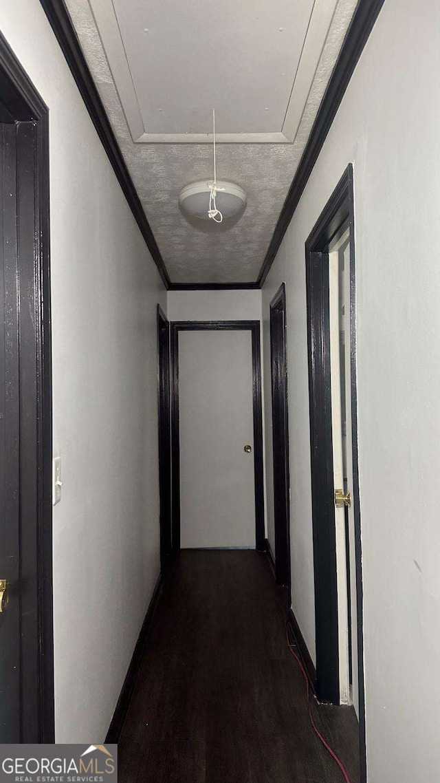 2812 Maple Rd SE, Rome, GA 30161 - hall featuring baseboards, attic access, dark wood-style floors, and ornamental molding